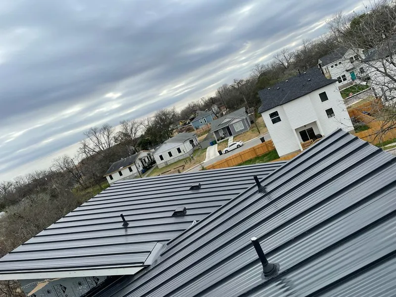Standing seam metal roof panels with vents for Skylight Repair in Corcoran